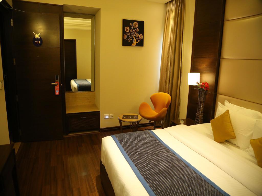 Hotel Oyo Premium Panchkula Sector 5 Zimmer foto